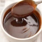 Authentic Homemade Tonkatsu sauce in a bowl with a spoon.