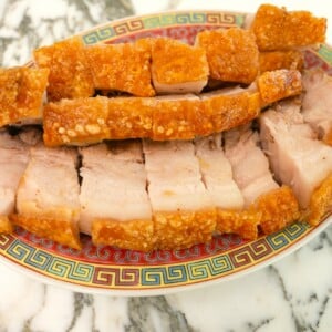 Air Fryer Crispy Pork Belly Cut on a plate