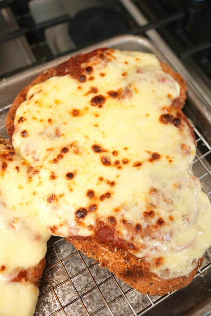 Crispy Chicken Parmesan with melted mozzarella cheese