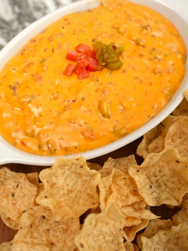Queso Dip in a bowl with tortilla chips