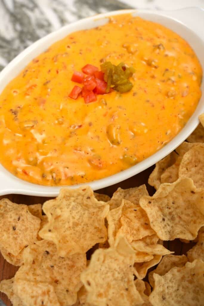 Queso Dip in a bowl with tortilla chips.