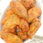 Lemon Pepper Wings on a white tray.