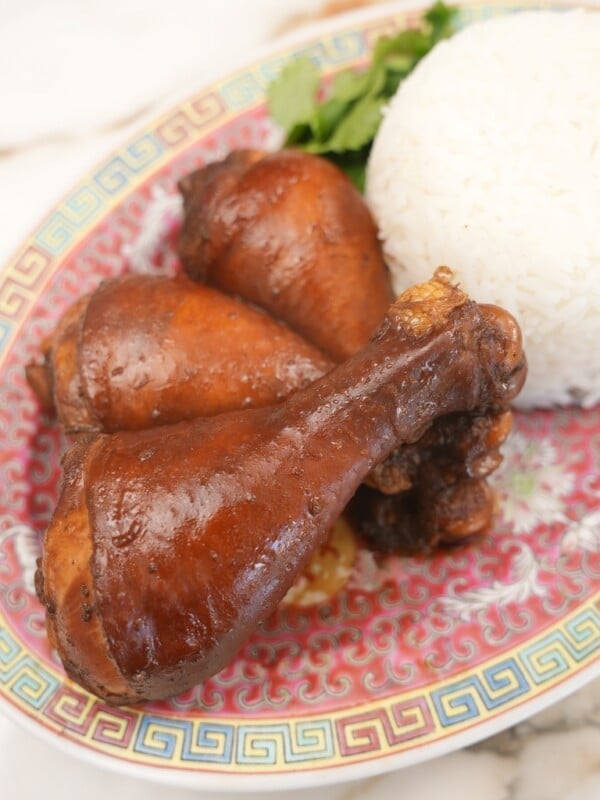 Soy sauce chicken on a plate with rice