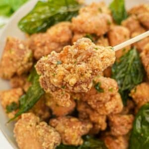 Crispy Taiwanese Popcorn Chicken in a bowl with fried basil.