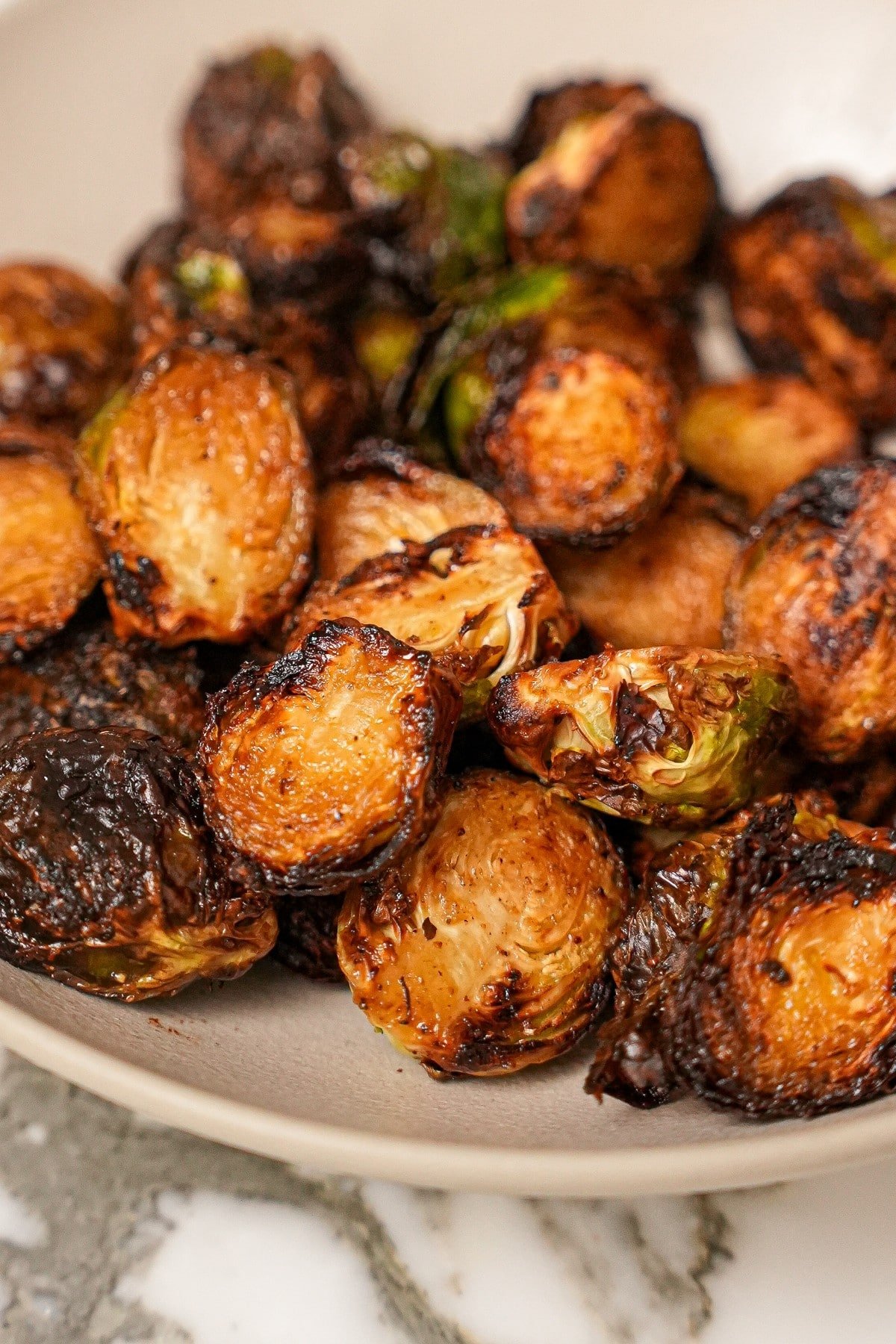 Crispy air fryer brussels sprouts in a bowl.