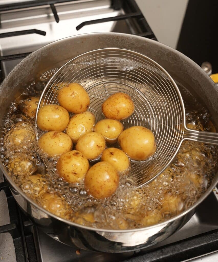 Potatoes boiling in salted water