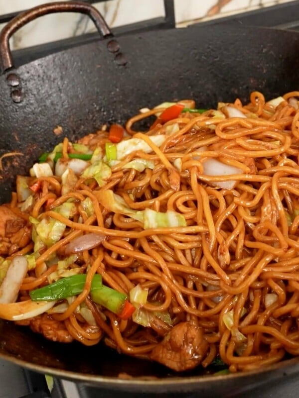 Chicken Lo Mein cooked in a wok.