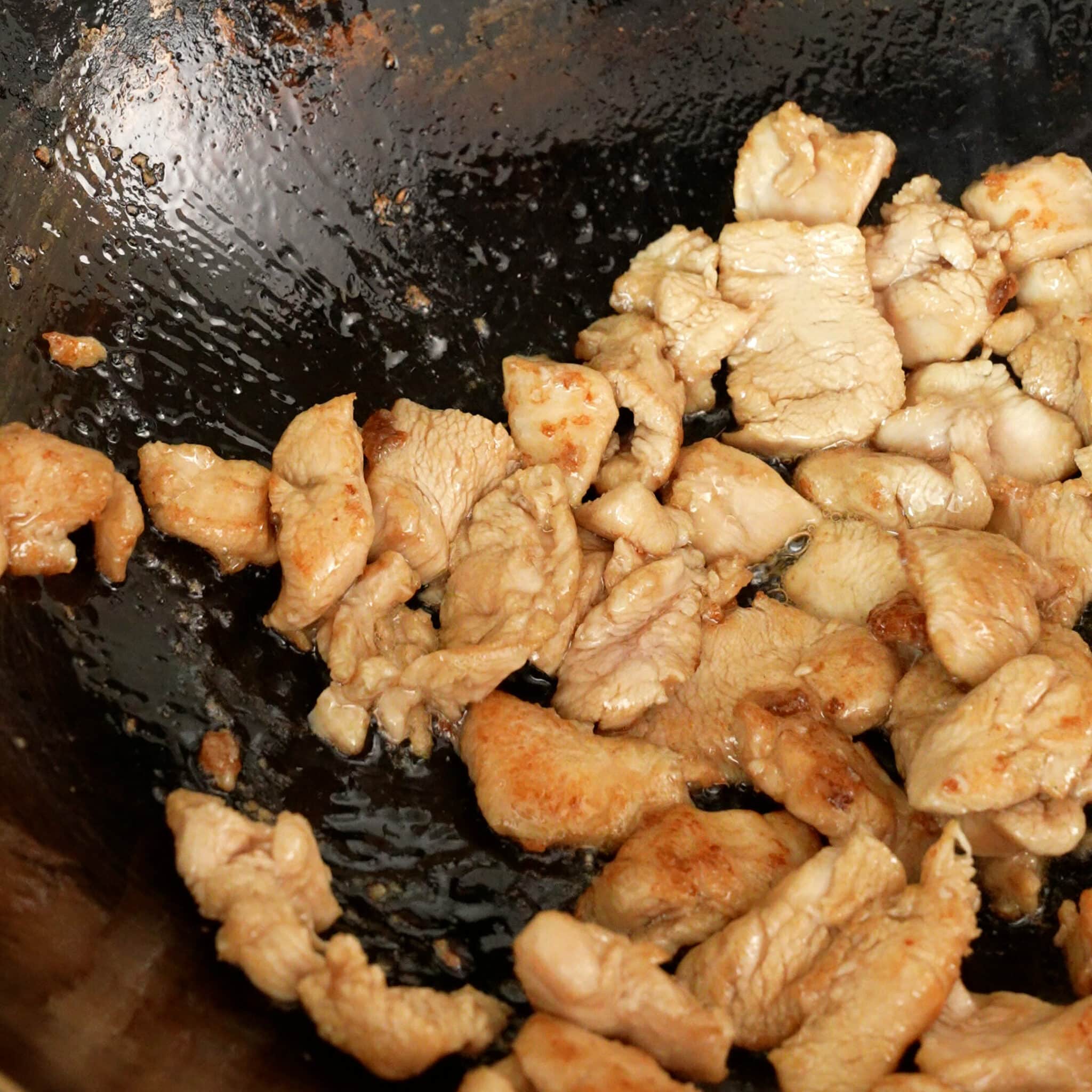 Cooked chicken in a wok.