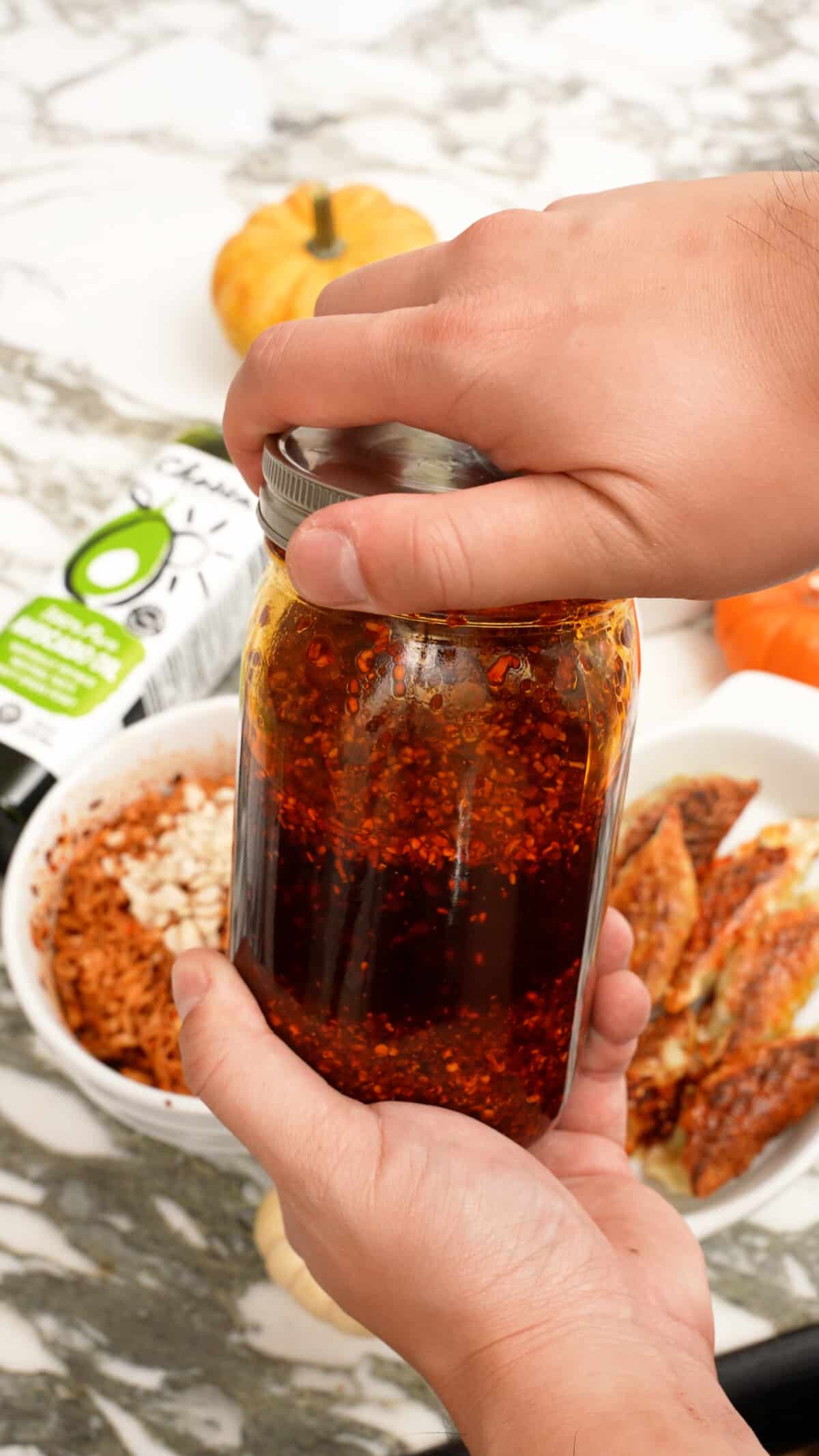 Chinese chili oil sealed in a jar.
