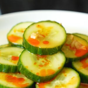 Chinese cucumber salad stacked on a white plate.