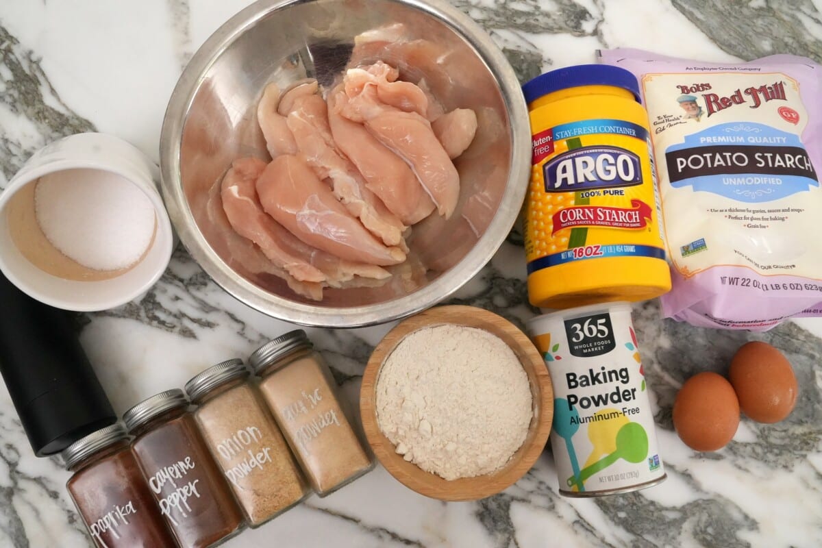 Ingredients for Fried Chicken Tenders on a table.