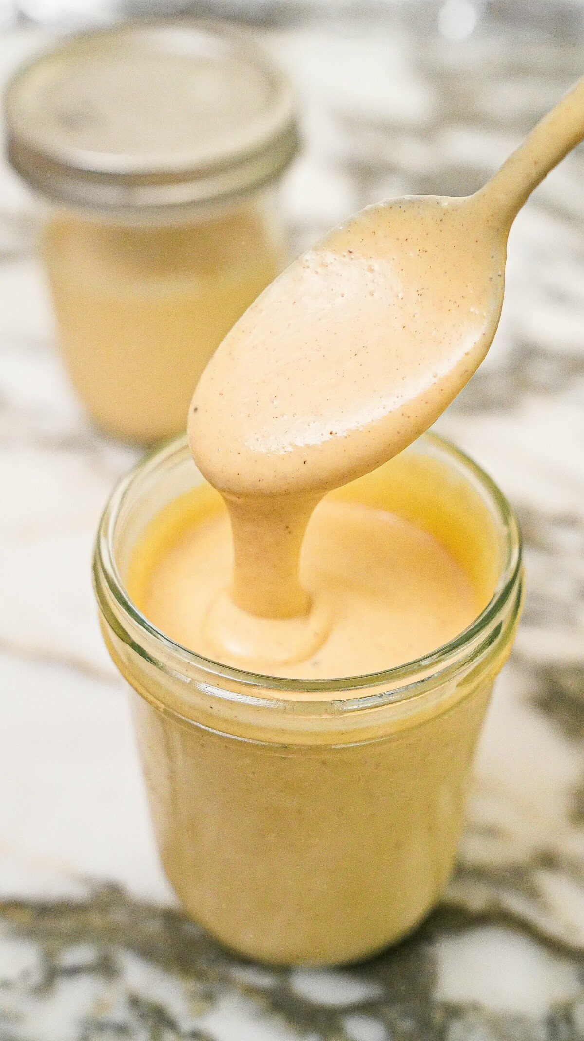 Homemade honey mustard sauce in a jar.