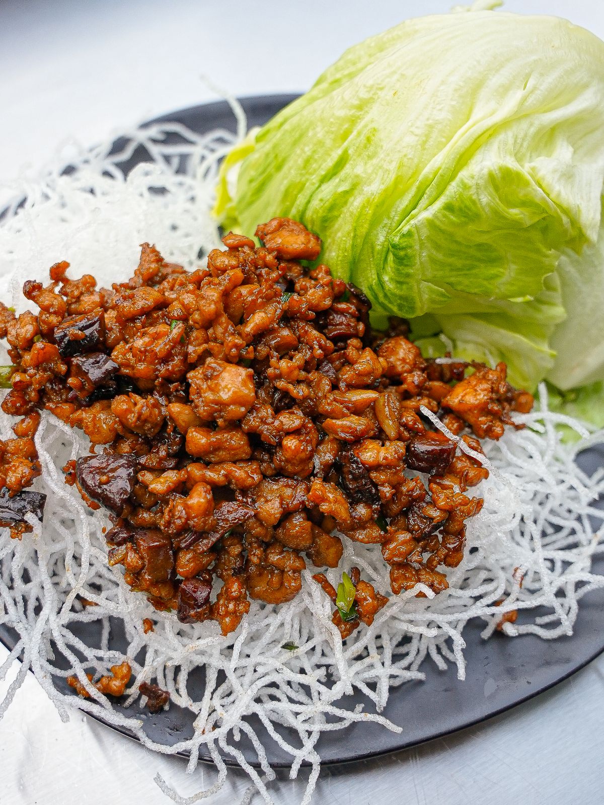 Copycat PF Chang's chicken lettuce wraps on a plate.