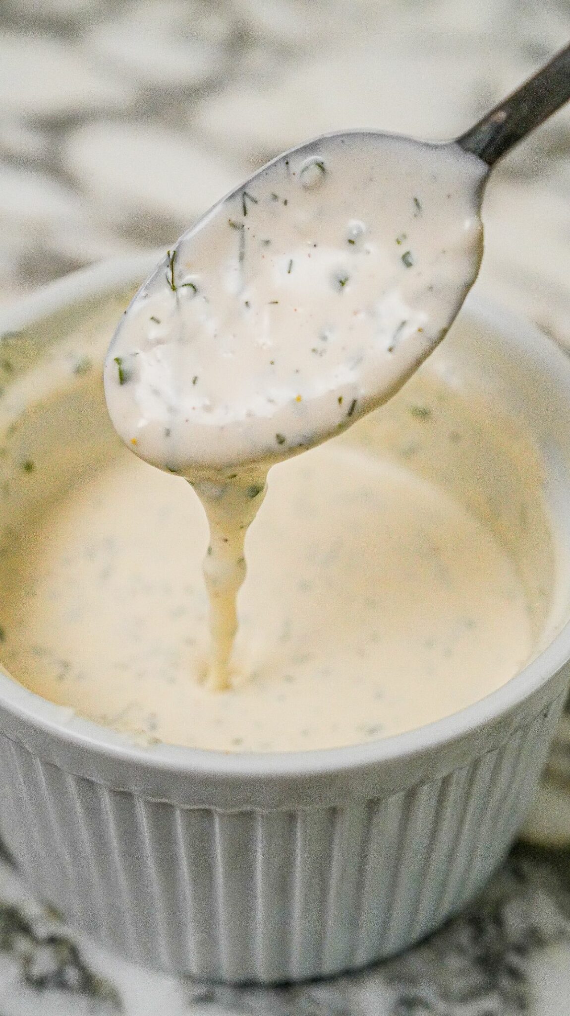 Homemade ranch dressing in a bowl.