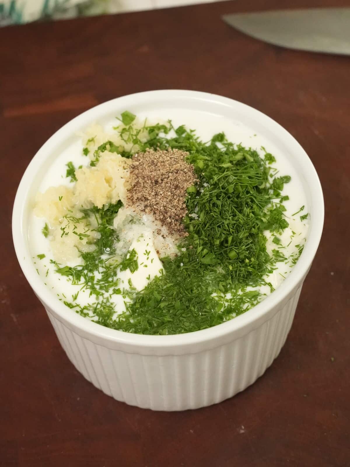 Ingredients for Ranch dressing in a bowl.