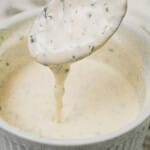 Ranch Dressing in a bowl with a spoon.