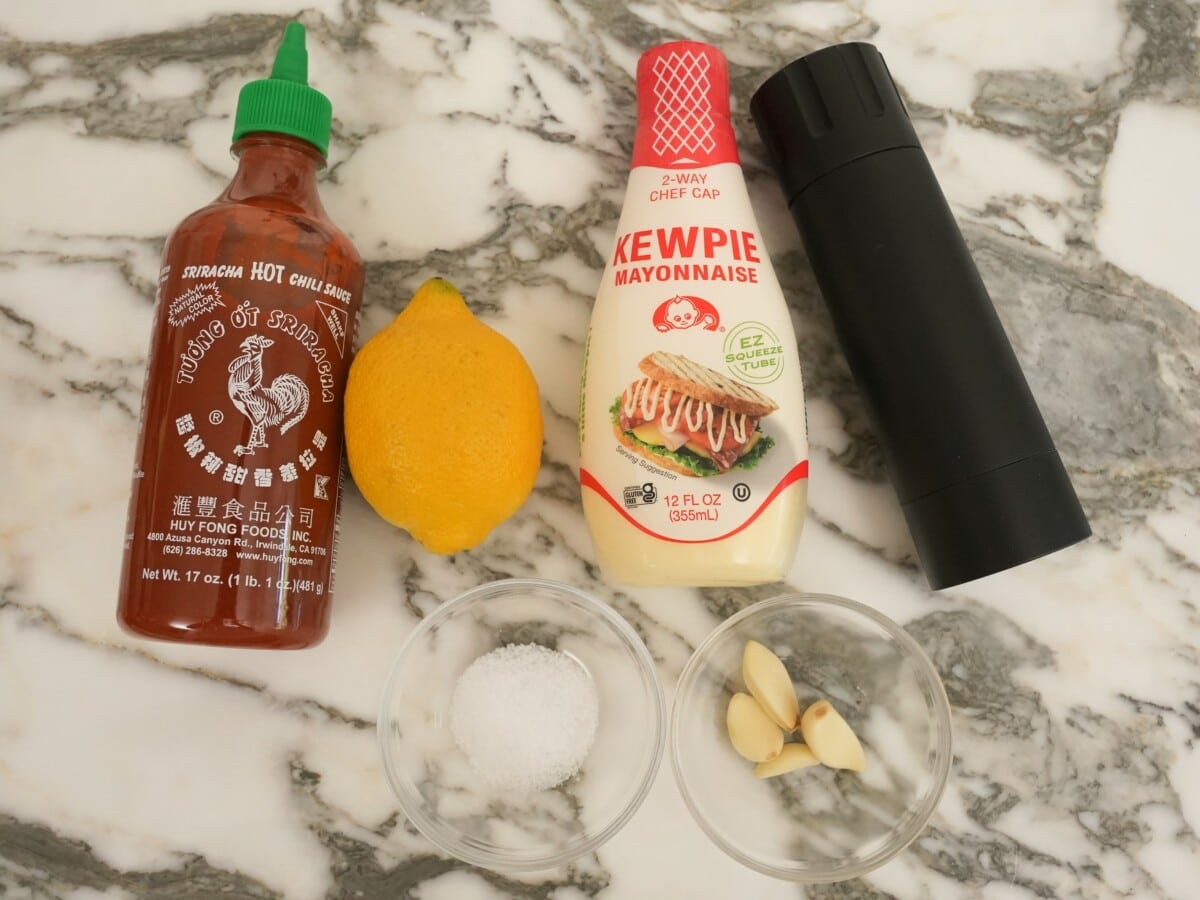 Raw ingredients for spicy mayo.