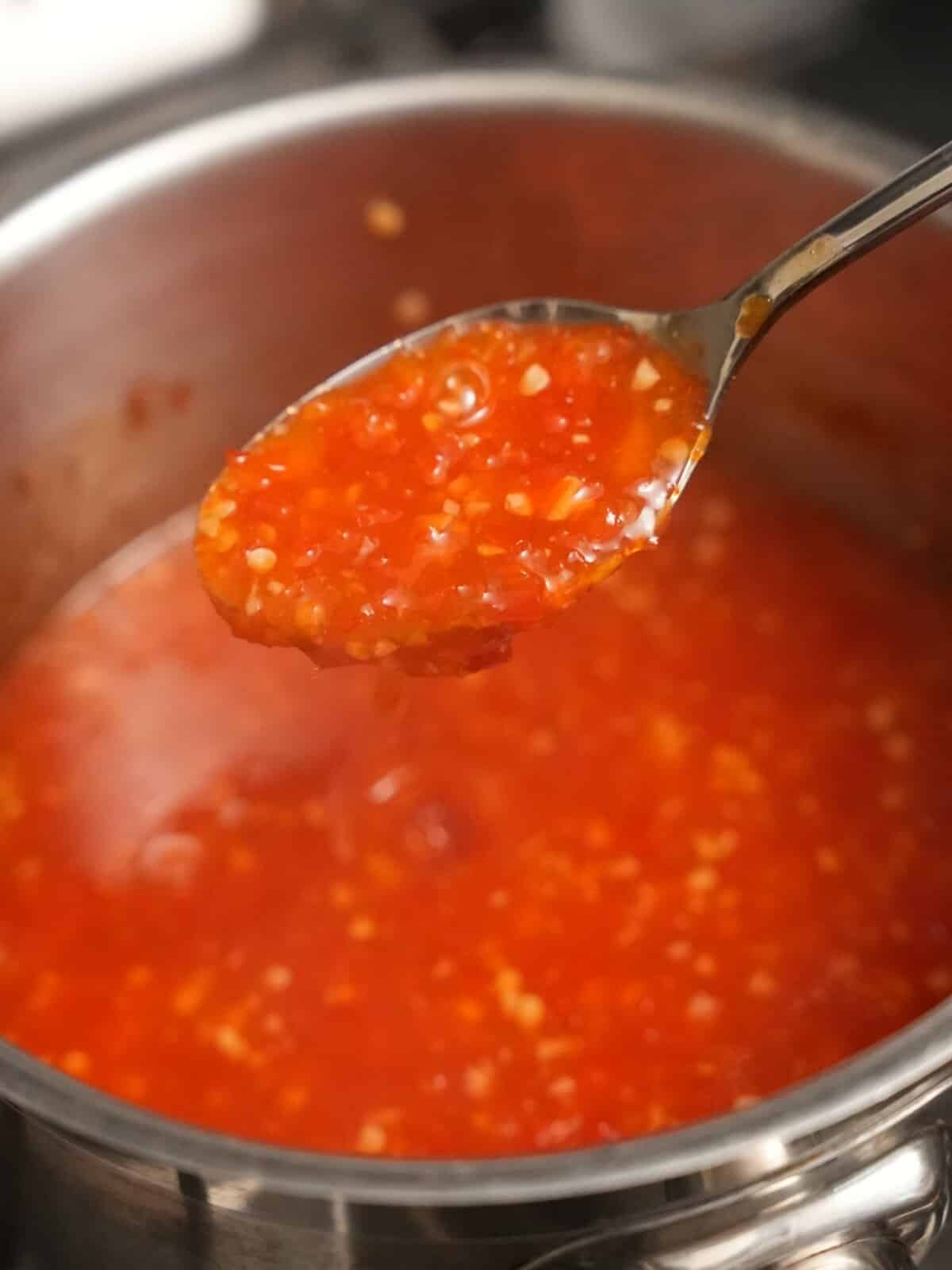 Finished thai sweet chili sauce cooked in a saucepan.