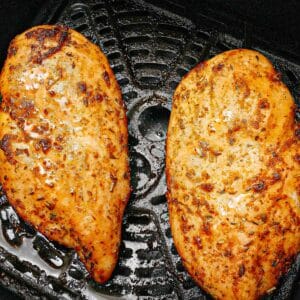 Juicy air fryer chicken breasts cooked in the air fryer.