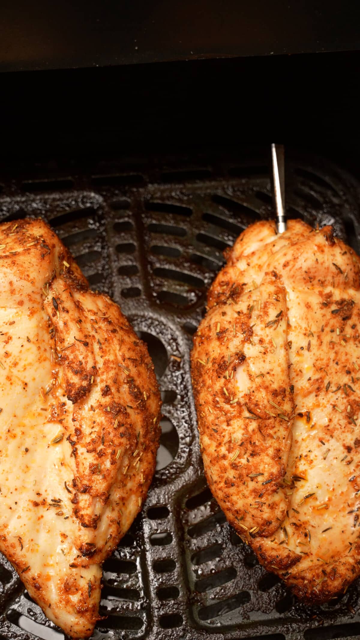 Air Fryer Chicken breasts cooked in the air fryer.