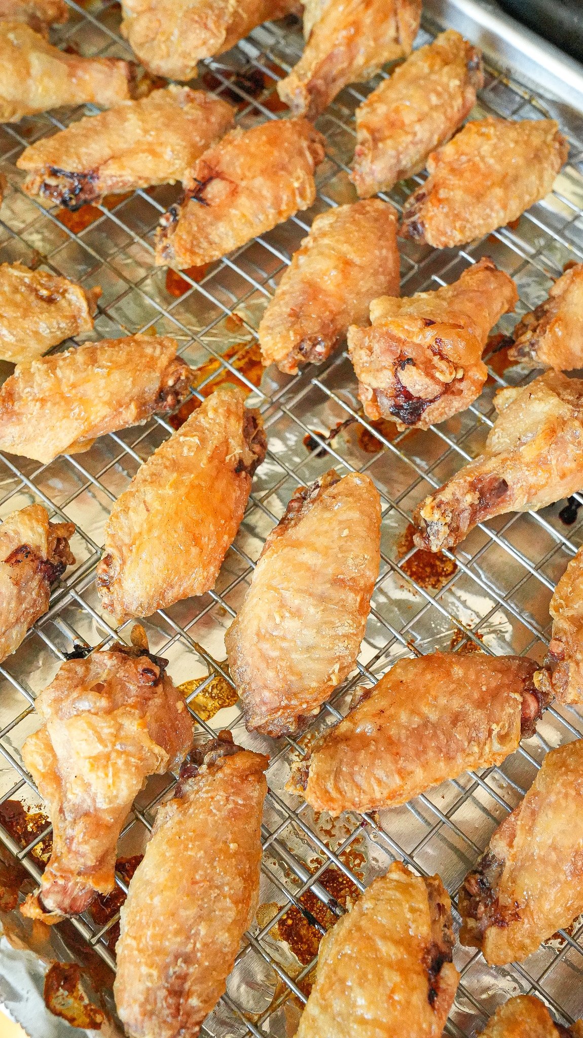 Baked chicken wings after cooking in the oven.