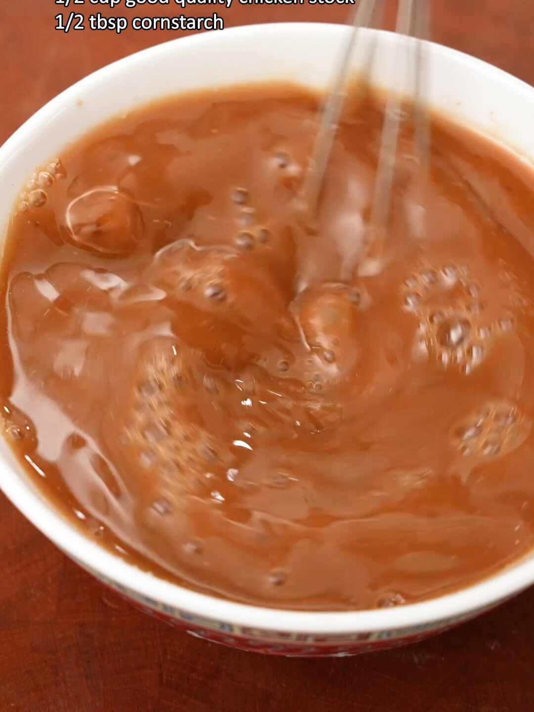 Mixing Mushroom chicken sauce in a bowl.