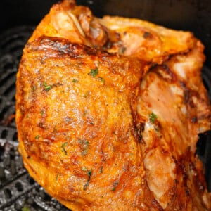 Air Fryer Turkey breast cooked in an air fryer with crispy skin.