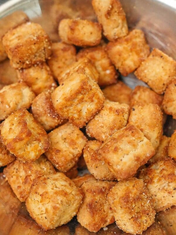 Crispy Air Fryer Tofu seasoned in a bowl.