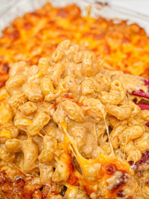 Creamy Baked Mac and Cheese in a casserole dish with cavatappi noodles.