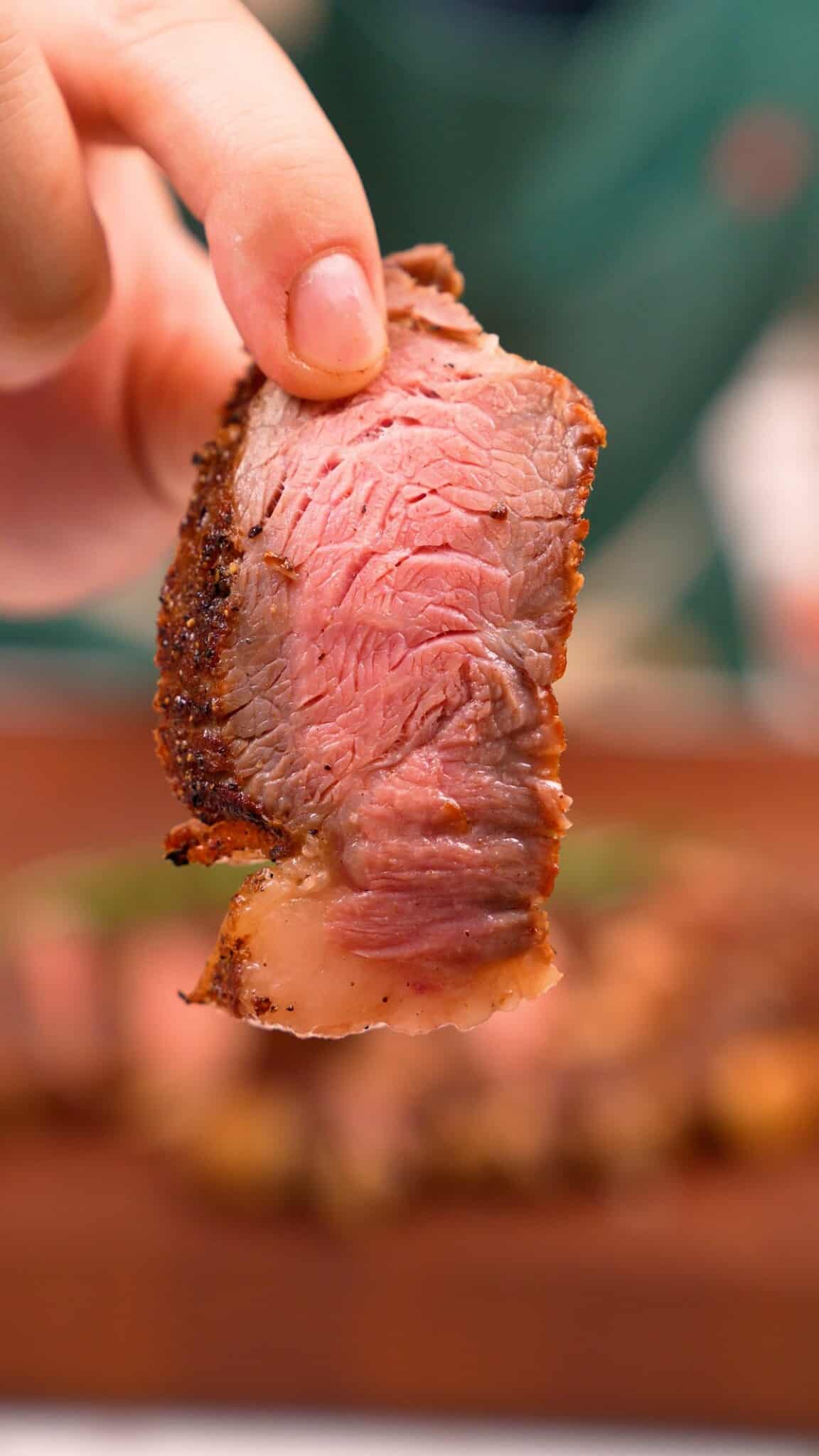 A piece of steak that is cooked to medium.