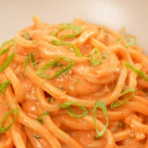 Cheesy Kimchi Udon in a bowl.