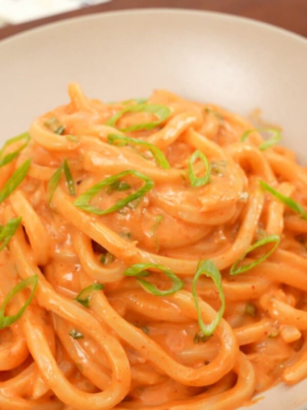 Cheesy Kimchi Udon in a bowl.