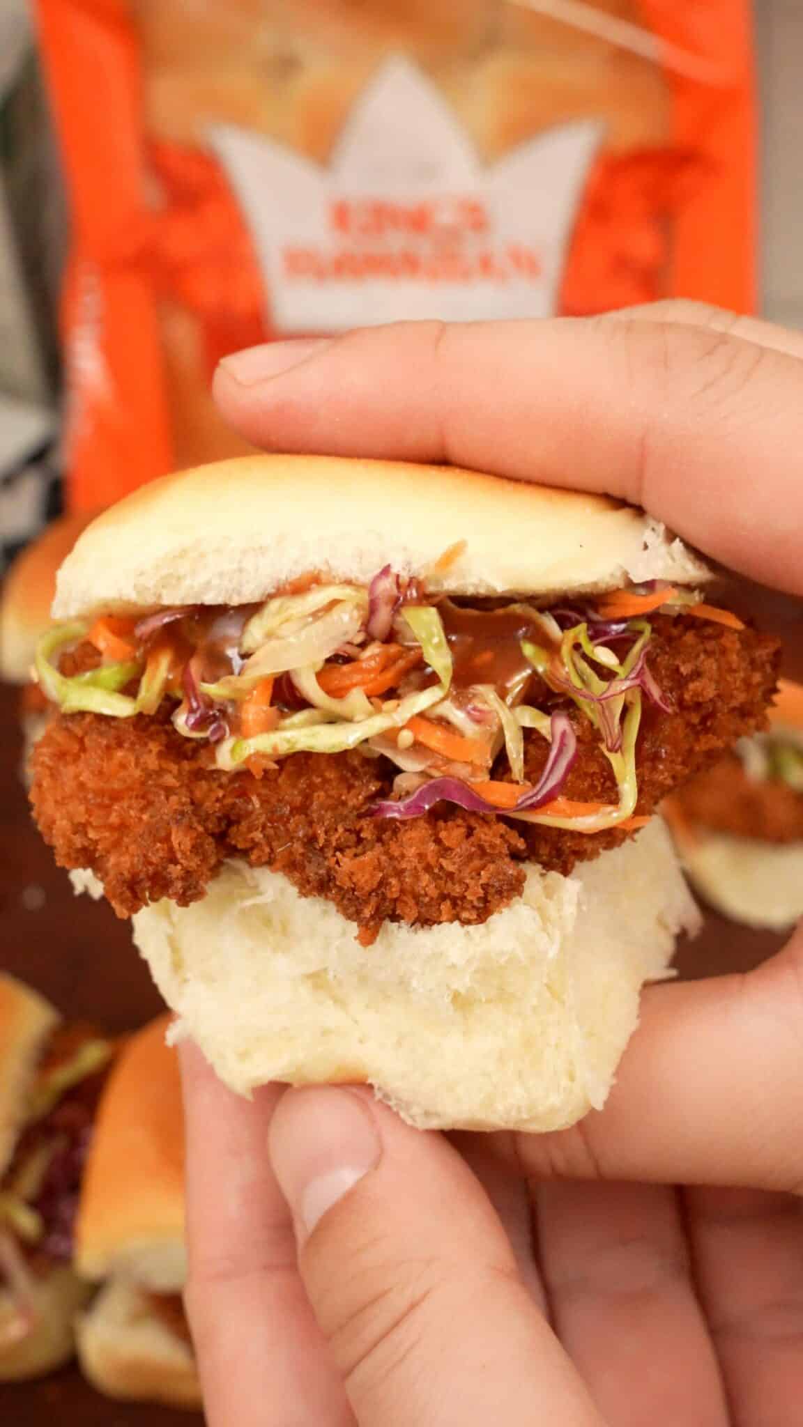 Chicken Katsu Sliders held in hands.