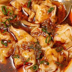 Din Tai Fung Spicy Wonton Sauce in a bowl with wontons.