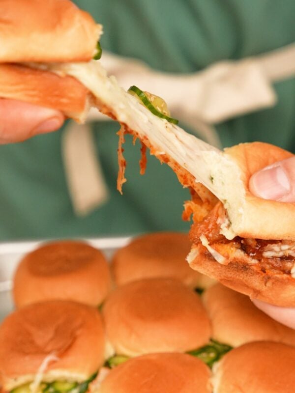 Korean Fire Chicken sliders on a tray.