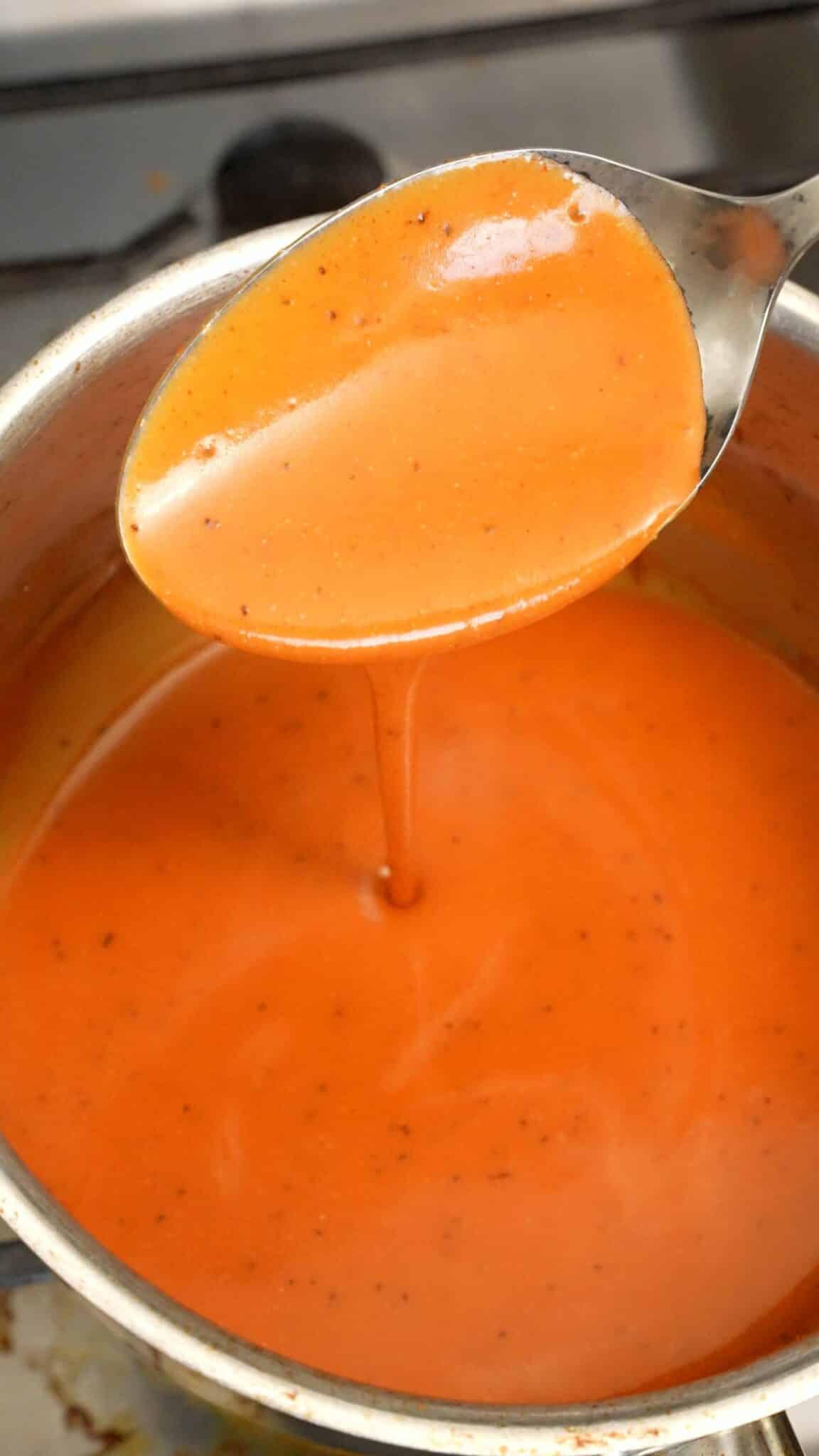 Buffalo sauce in a pot.