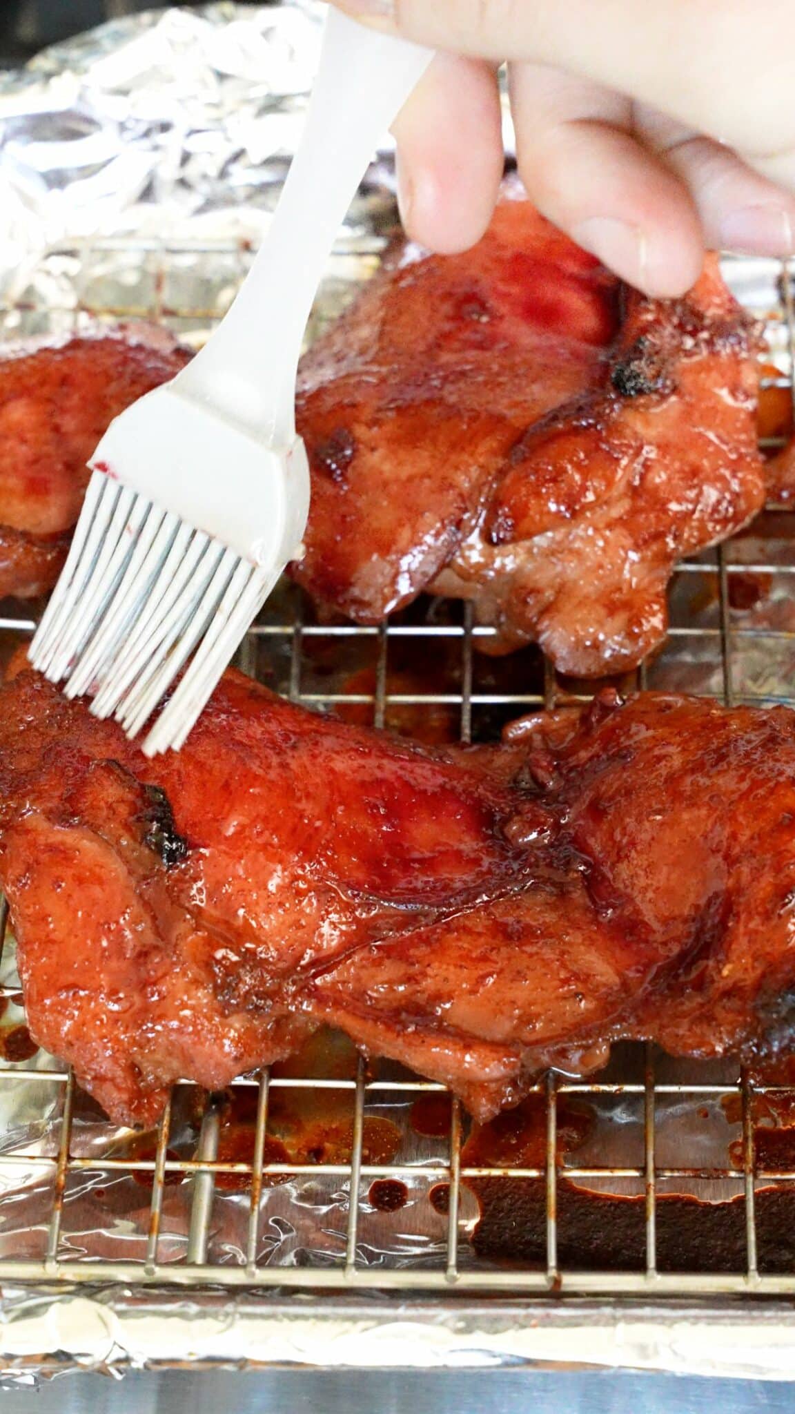 Char Siu Chicken cooked on a wire rack.