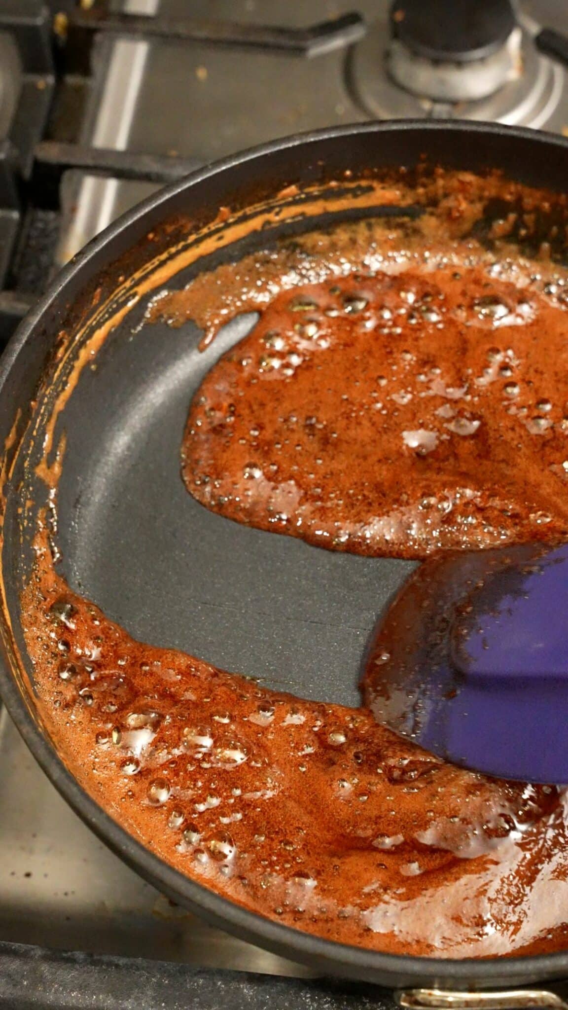 Honey Soy glaze thickened in a pan.