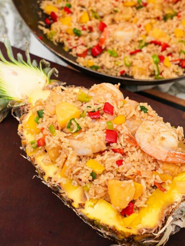 Pineapple Fried Rice plated in a carved out pineapple.