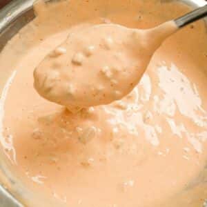 In N Out sauce in a bowl with a spoon.