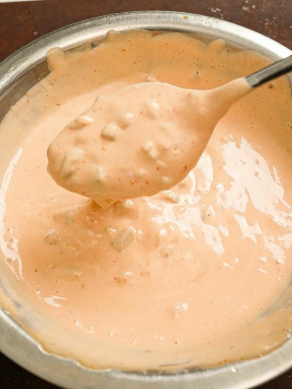 In N Out sauce in a bowl with a spoon.