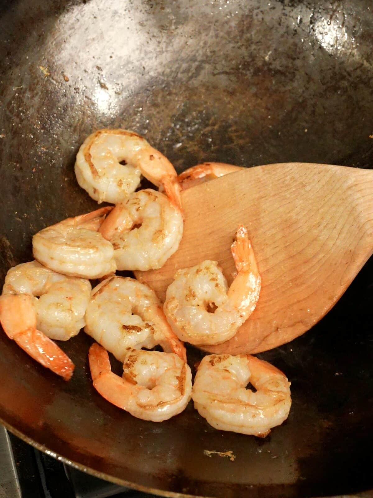 Shrimp cooked in a wok.