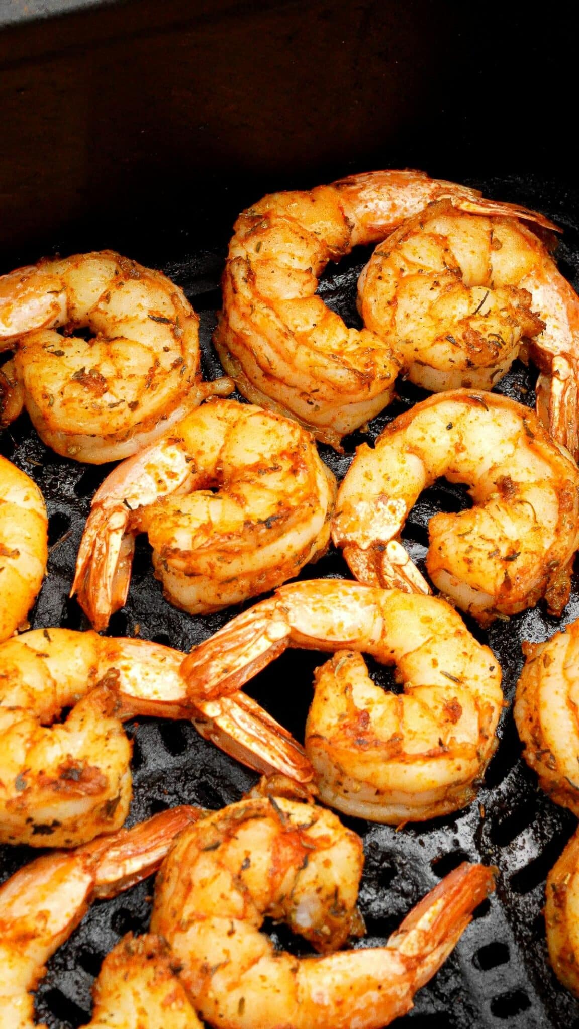 Air Fryer shrimp cooked in the air fryer.