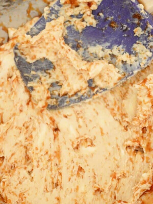 Benihana garlic butter being mixed with a spatula.