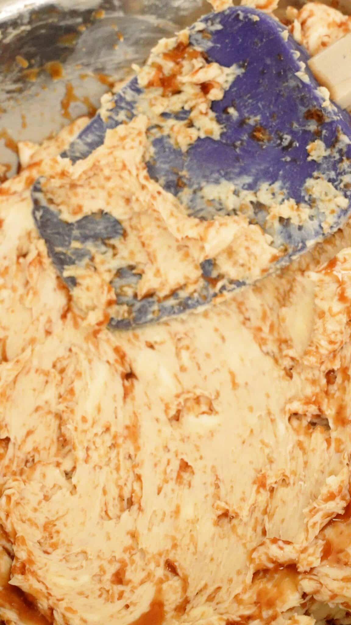 Benihana garlic butter being mixed with a spatula.