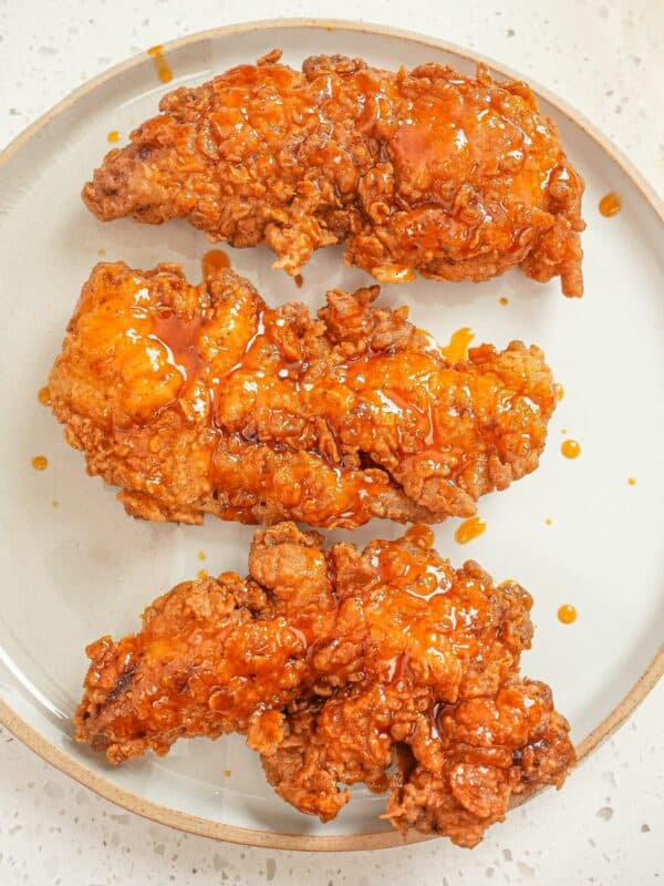 Crispy Hot Honey Chicken Tenders on a plate.