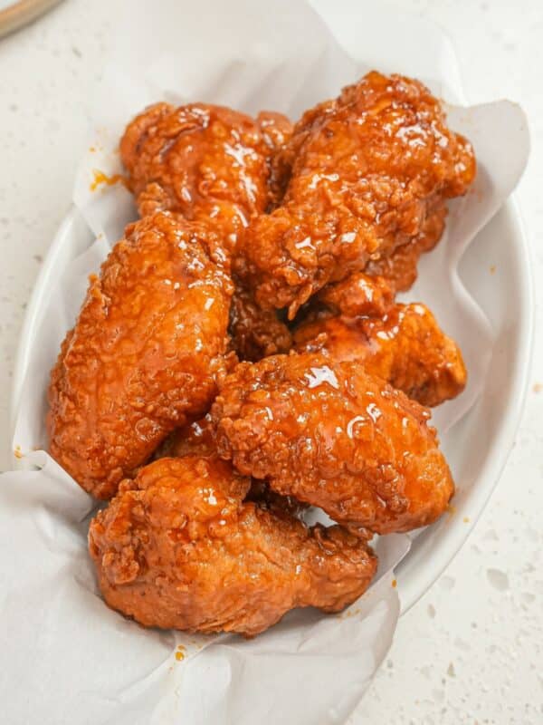 Crispy Hot Honey Chicken Wings in a white bowl.