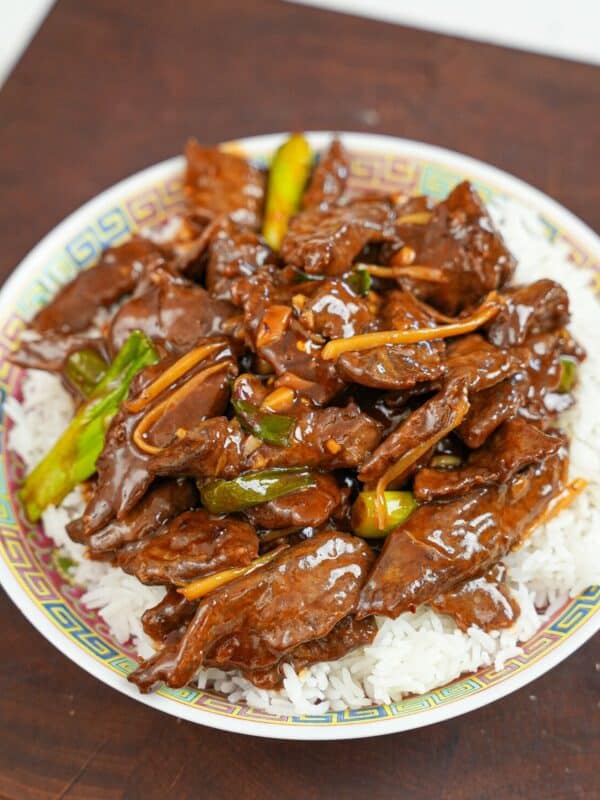 Ginger Beef on a plate of white rice.