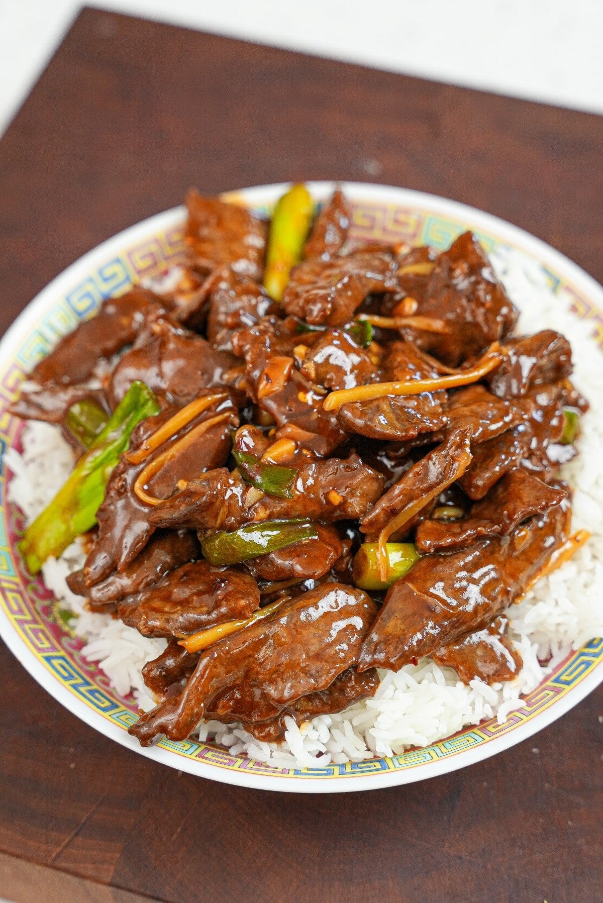 Ginger Beef on a plate of white rice.